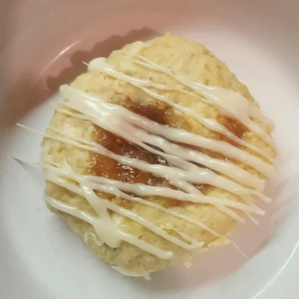 receta Empreintes digitales Tyler's Framboise avec glaçage au chocolat blanc