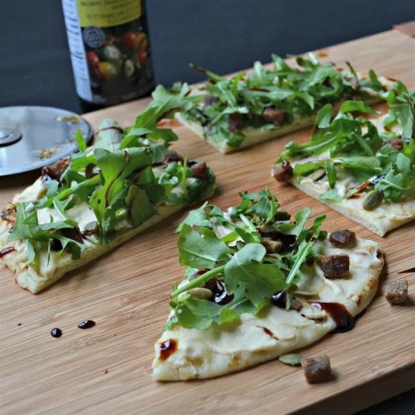 receta Mini Pizzas De Rúcula Y Hummus