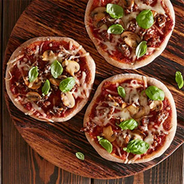 recette Mini-pizzas aux saucisses et aux champignons
