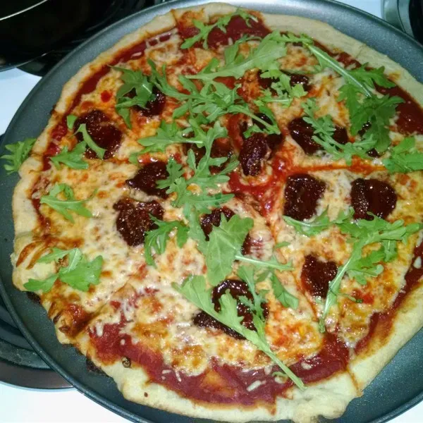 receta Pizza De Tomates Secos Y Rúcula