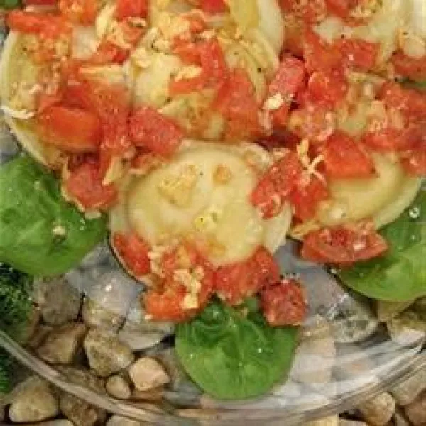 receta Raviolis au fromage avec sauce aux tomates fraîches et aux artichauts