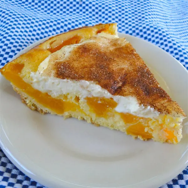 receta Tarte aux pêches et à la crème primée