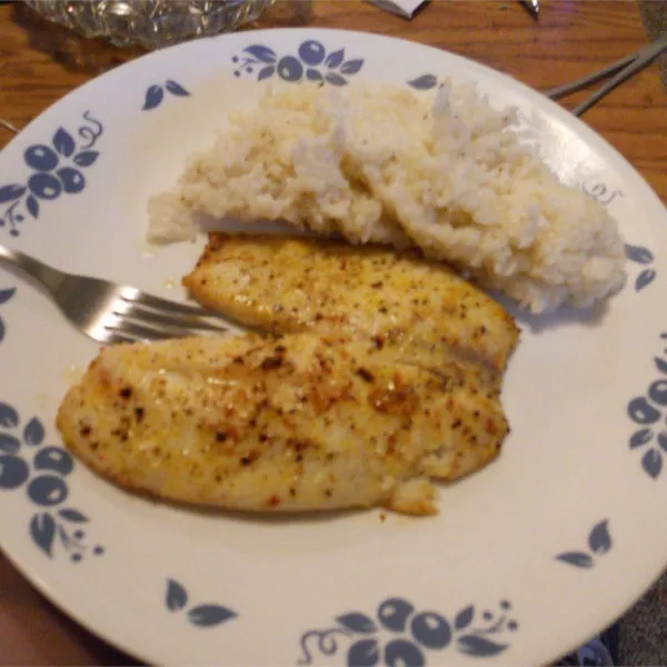 receta Tilapia au four avec riz au beurre et à la noix de coco